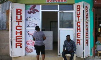 Fish monger and customer